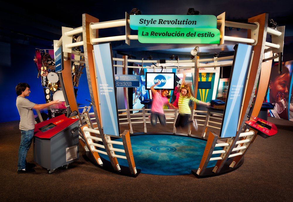 Children exploring the Style Revolution exhibit from MathAlive! exhibition.jpg