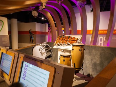 Image of children playing with sound machine in Boost