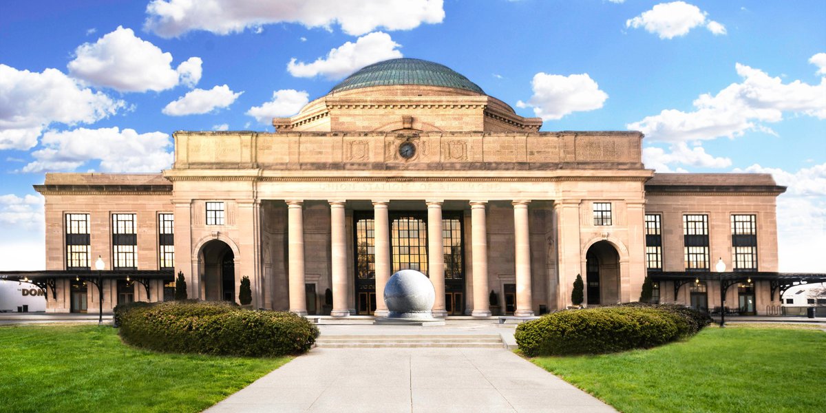 Exterior shot of Science Museum during the day.